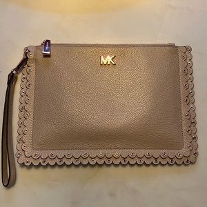Michael Kors Rose Gold Travel XL Large Clutch Wristlet. Gently used a few times.